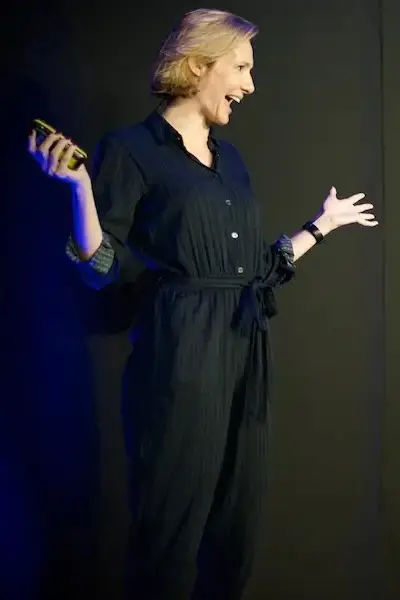 Christine Vallure on stage at UX London.