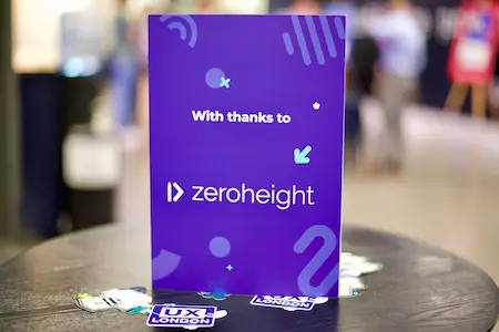 A sign on a table that reads: With thanks to zeroheight.